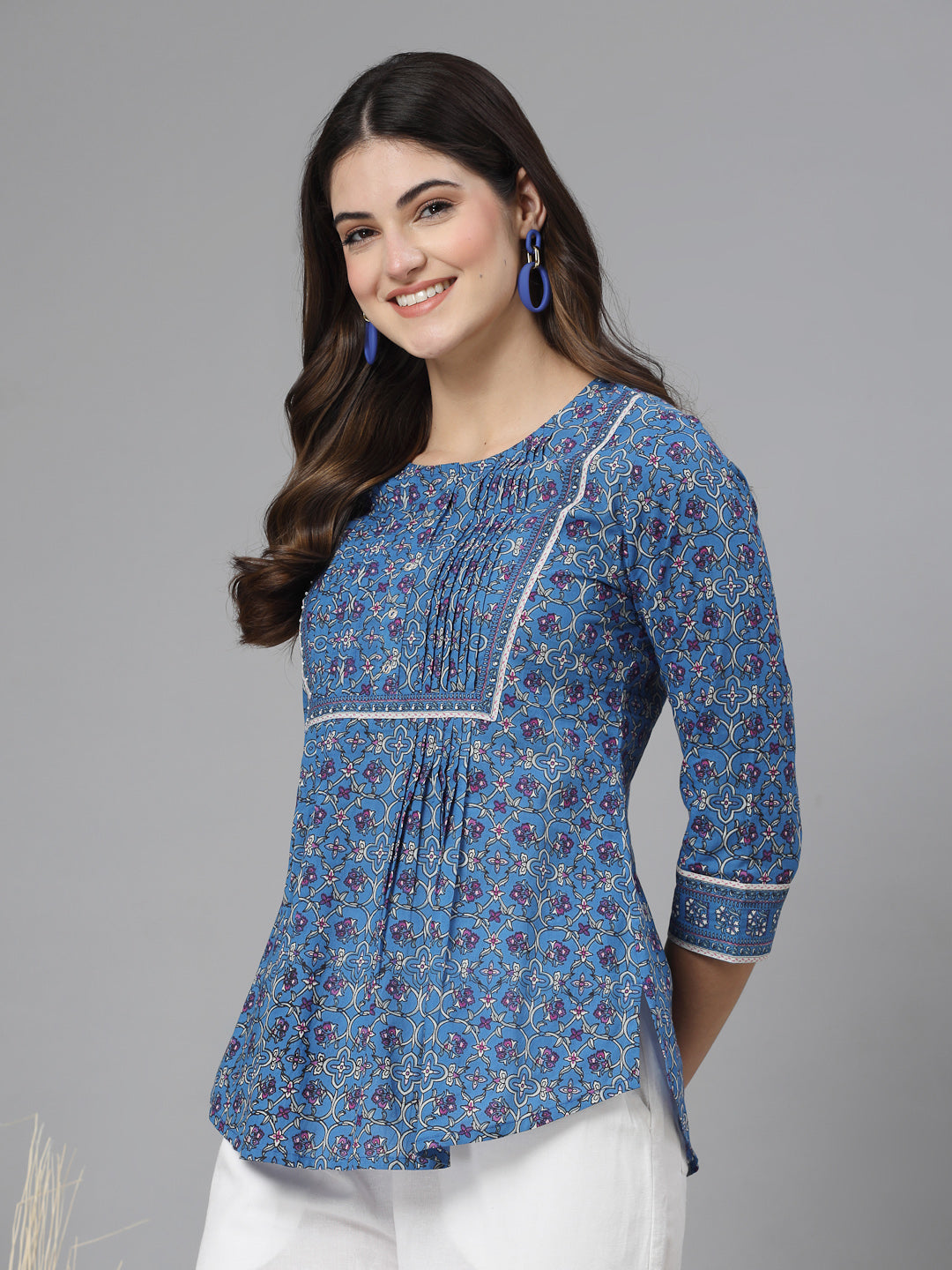 Floral print pintucks top