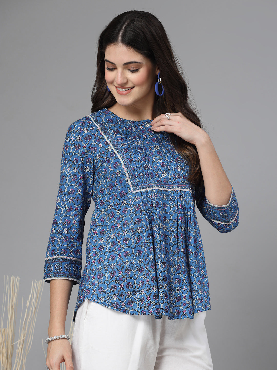 Floral print pintucks top