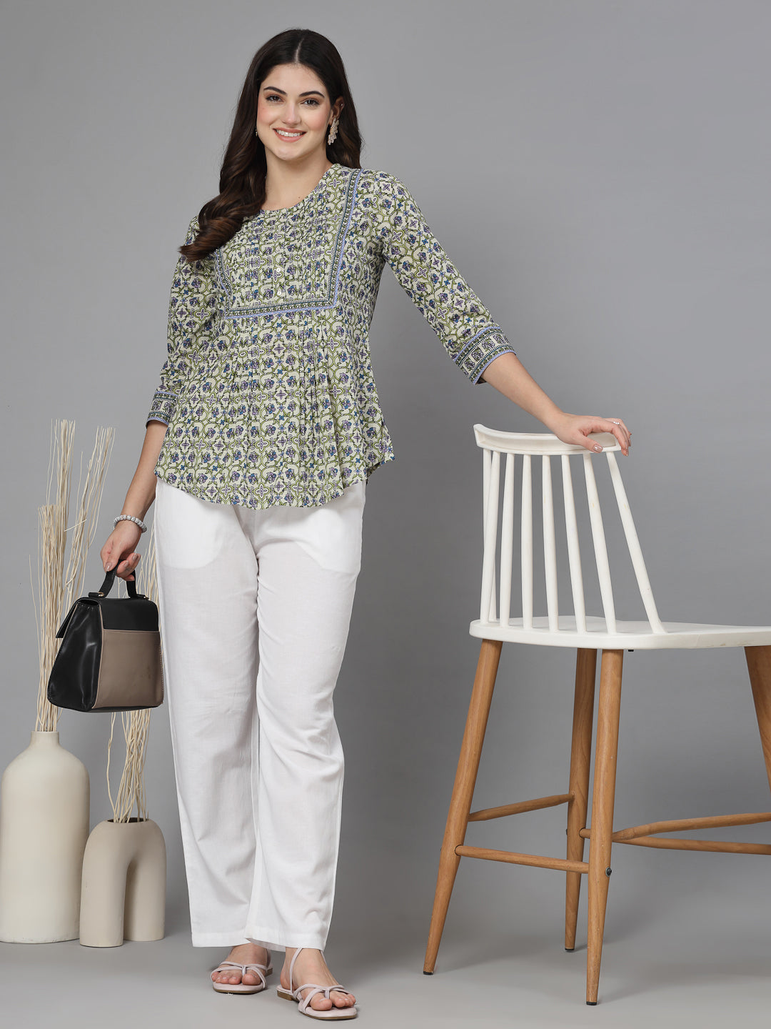 Floral print pintucks top