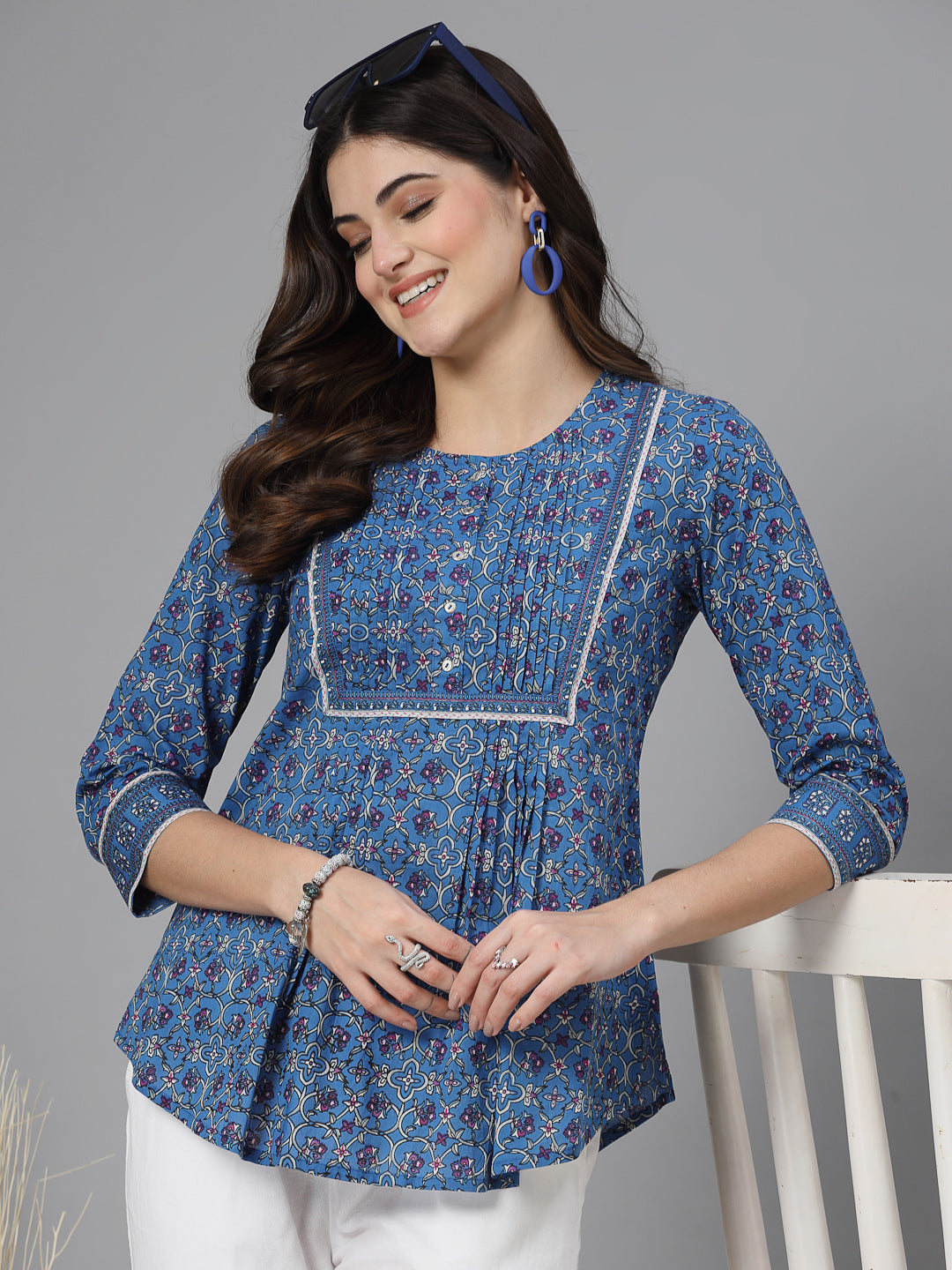 Floral print pintucks top