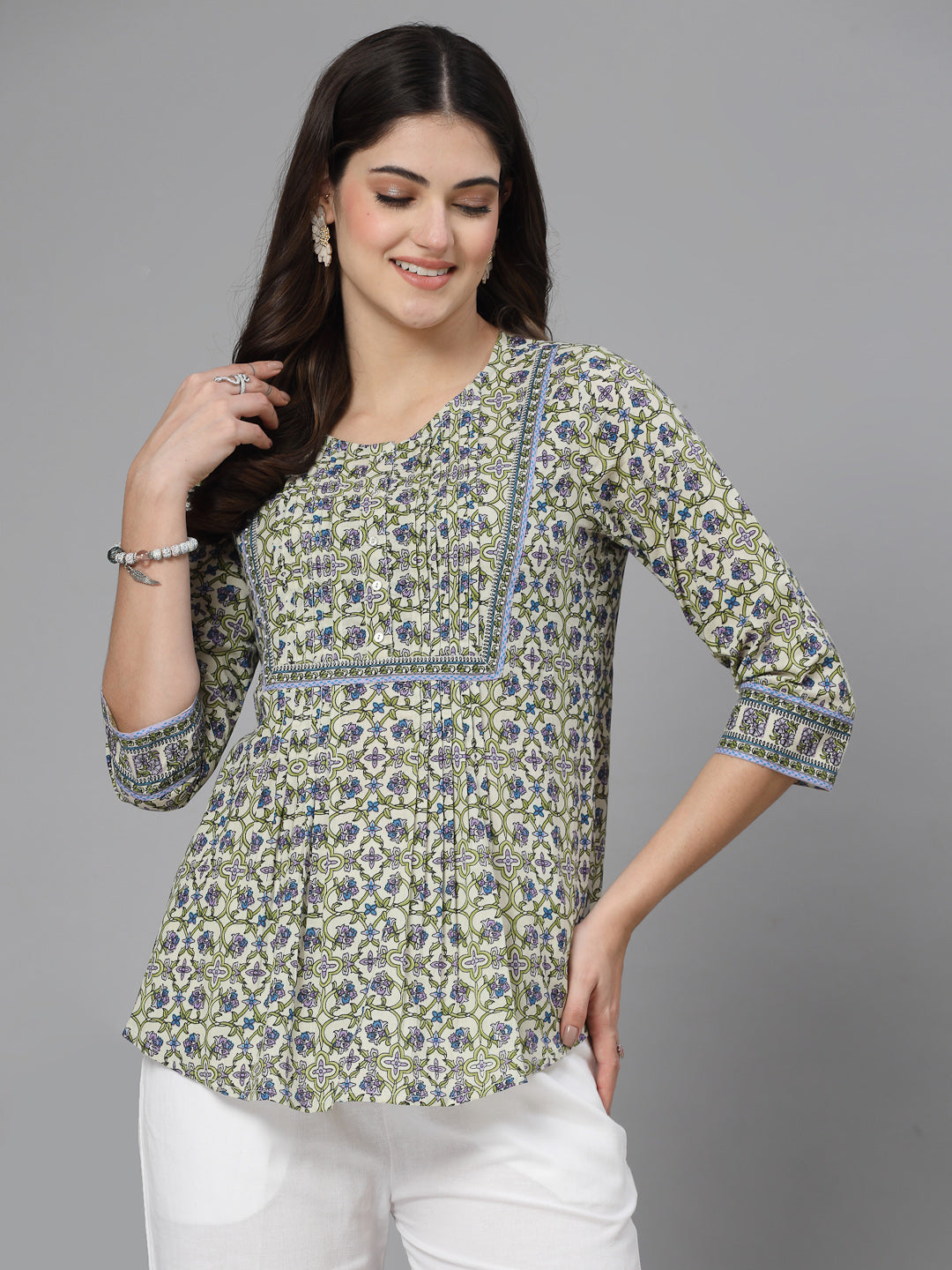 Floral print pintucks top