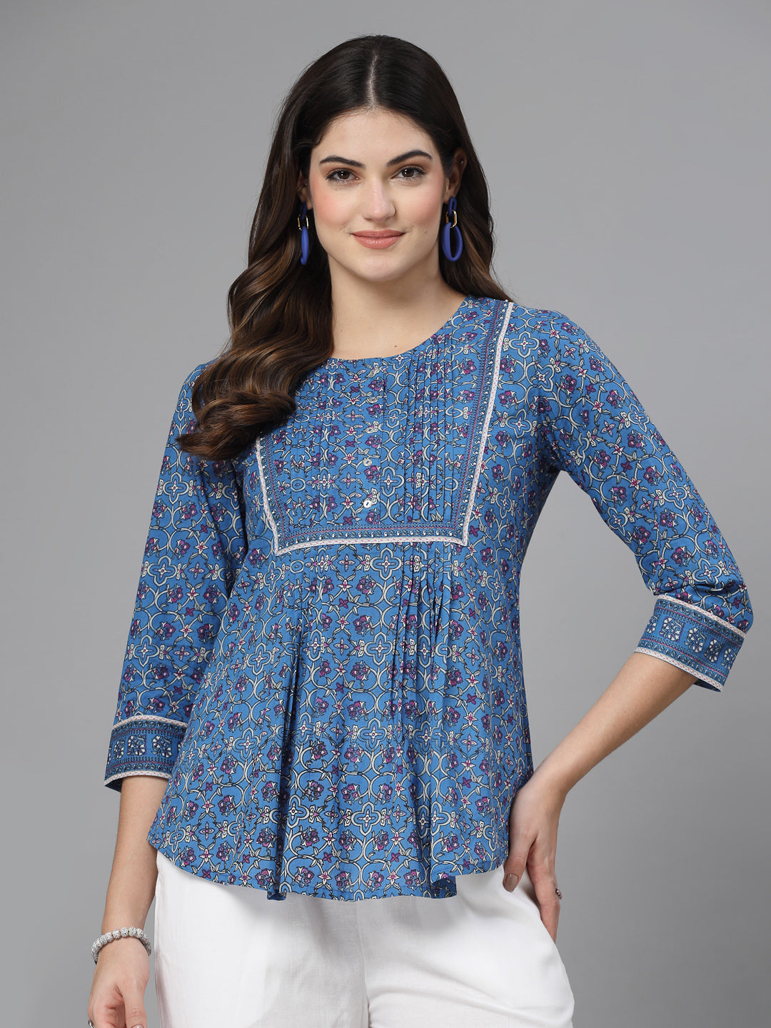 Floral print pintucks top